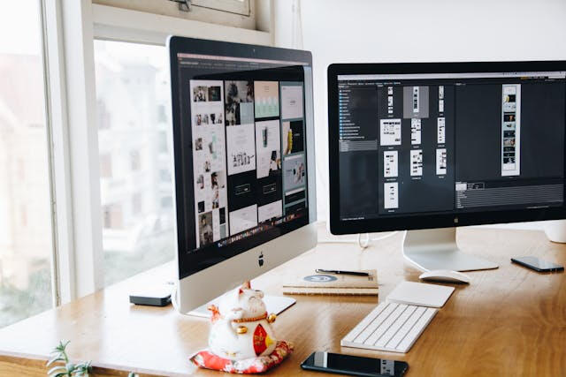 Responsive website design – Minneapolis freelance designer Computer monitors showing design tool for responsive web design project