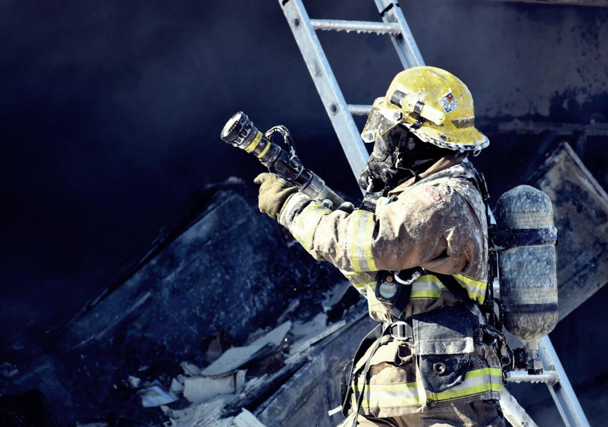 Disaster preparation consultant website design – Minneapolis portfolio Firefighter in uniform, symbolizing disaster preparation website project